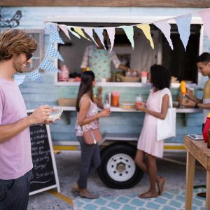 customers-having-snacks-from-food-truck-EDLBVPX.jpg customers-having-snacks-from-food-truck-EDLBVPX.jpg